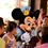 Minnie Mouse visits a family eating breakfast at Makahiki 